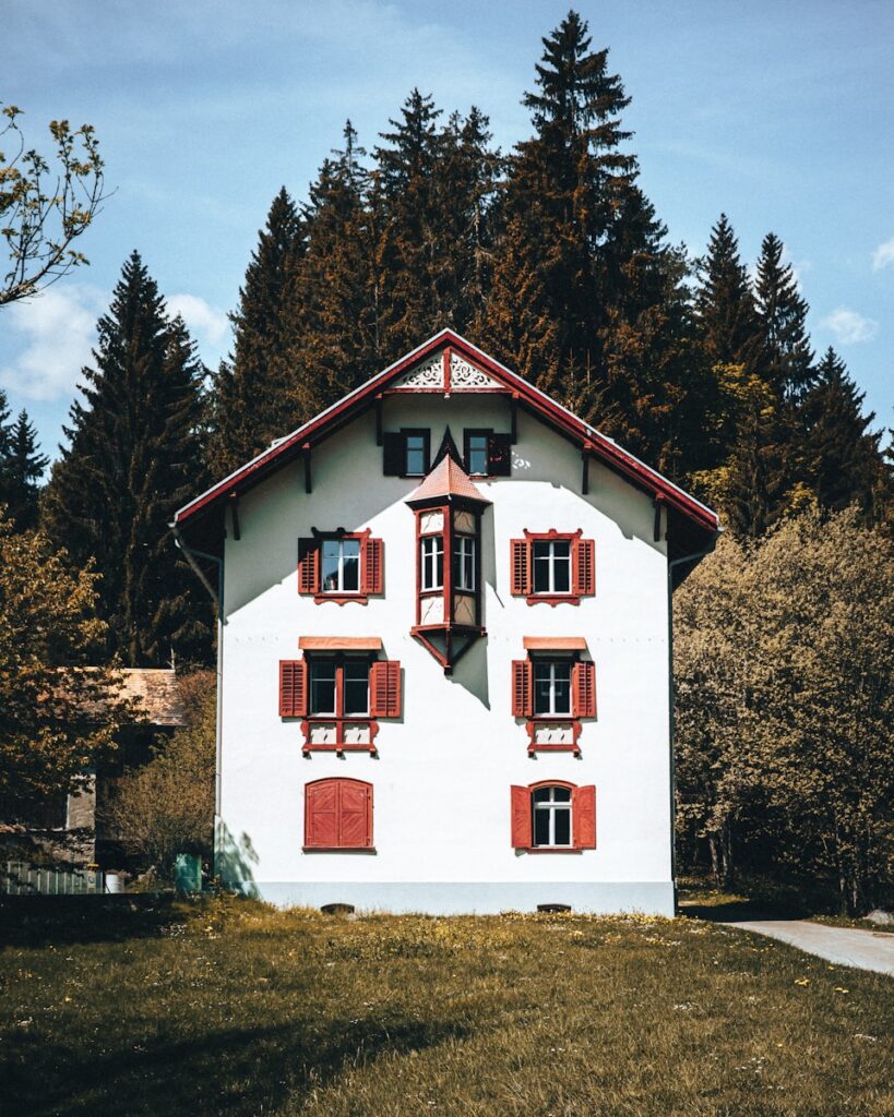 a white house with red trim
